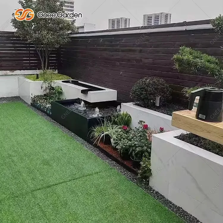 Garden water feature beside landscaping